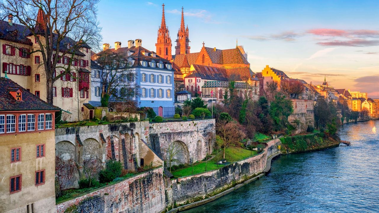 Basel’s old town and Minster above the Rhine at sunset, the host city of WordCamp Europe 2025
