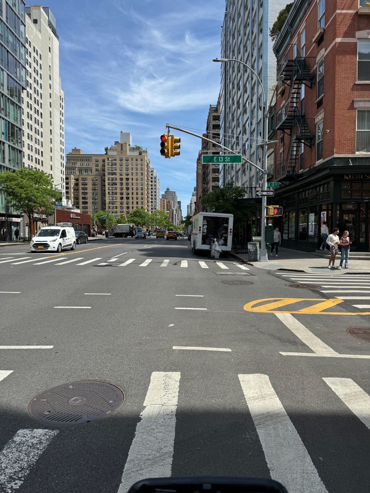 A street crossing in New York City in summer